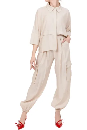 TENSIONE IN Pantaloni cargo con pinces beige chiaro