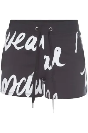 Moschino Shorts Tuta Neri con Scritta All Over