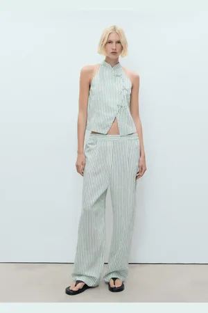 MANGO Pantaloni fluidi righe