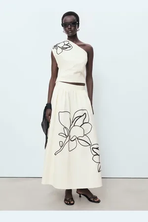 MANGO Top asimmetrico ricamo fiore