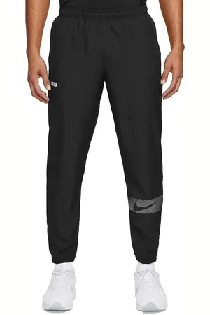 Nike PANTALONI DRI-FIT WOVEN CHALLENGER FLASH