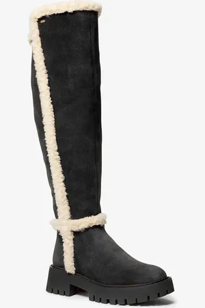 Michael Kors MK Stivale Asher in shearling sintetico e pelle scamosciata