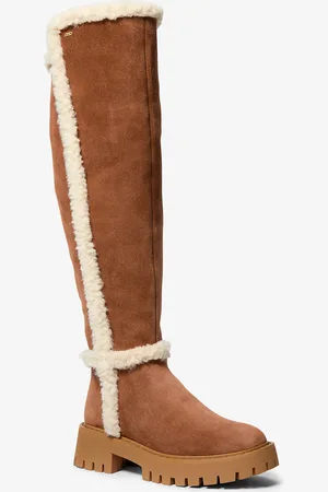 Michael Kors MK Stivale Asher in shearling sintetico e pelle scamosciata