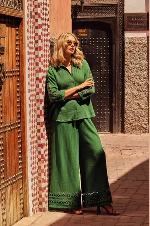 ICONIQUE PANTALONI PALAZZO CON MERLETTI INTARSIATI