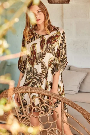 ICONIQUE PONCHO CON PAILLETTES
