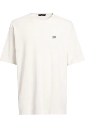 Dolce & Gabbana T-Shirt In Cotone Con Placca Logo In Metallo