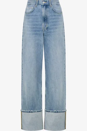Moschino Denim trousers with patches
