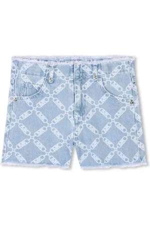 Michael Kors Shorts in denim con stampa logata lavaggio