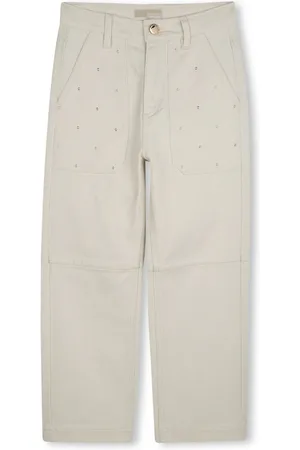 Michael Kors Jeans gamba dritta con tasconi borchiati color crema