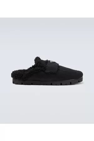 Prada Slippers in suede con shearling