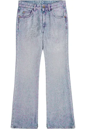 VERSACE Jeans flared con stampa