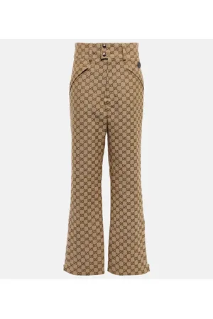Gucci Pantaloni flared GG in canvas di cotone