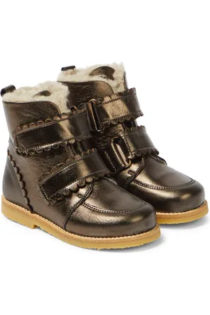 Petit Nord Stivali stringati in pelle con shearling