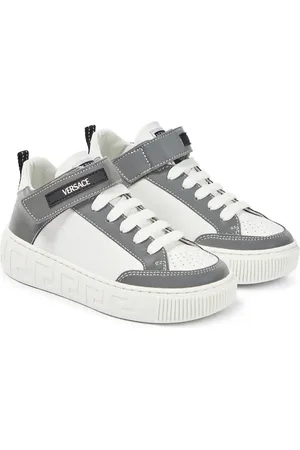 VERSACE Sneakers alte in pelle con logo