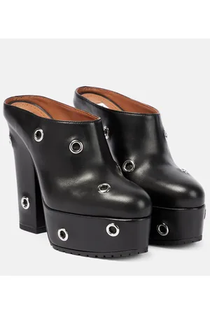 Alaïa Alaïa Mules in pelle con occhielli