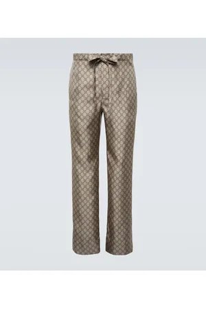 Gucci Pantaloni regular in seta GG