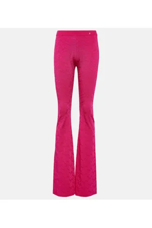 VERSACE Pantaloni flared La Greca a vita alta