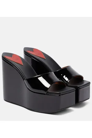 Alaïa Alaïa Sandali in vernice con zeppa e plateau