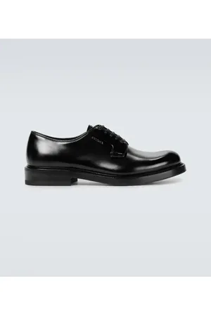 Prada Stringate in pelle lucida