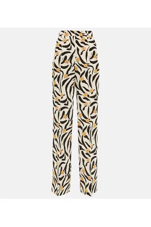 Nanushka Pantaloni Lanai a vita alta con stampa