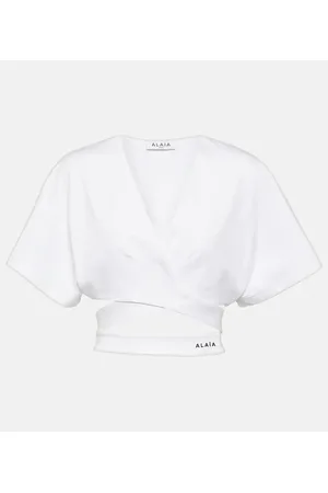 Alaïa Alaïa Top cropped in jersey di cotone con logo