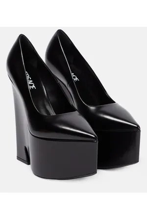 VERSACE Pumps Tempest con plateau