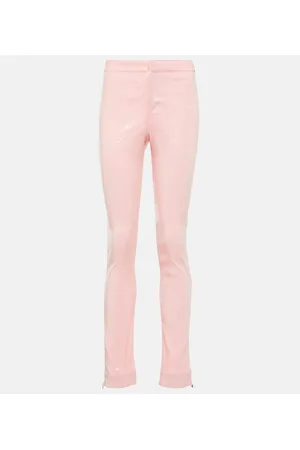 ROTATE Pantaloni slim con paillettes