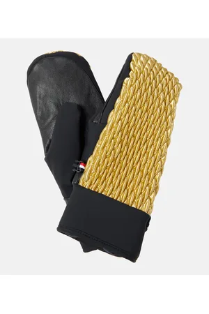 Fusalp Muffole trapuntate con finiture in pelle