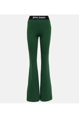 Palm Angels Pantaloni flared in jersey di cotone