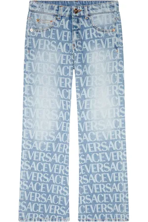 VERSACE Jeans flared con stampa