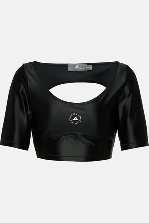 adidas Top cropped in tessuto tecnico con logo