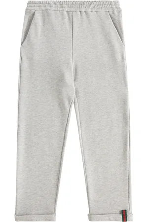 Gucci Pantaloni sportivi Web Stripe in jersey