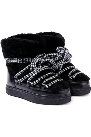 INUIKII Stivaletti Curly in pelle e shearling