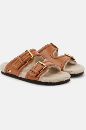 VALENTINO GARAVANI Sandali Fussfriend in pelle con shearling