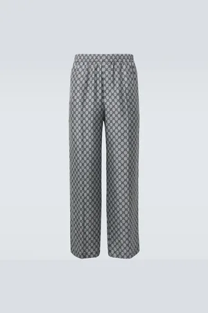 Gucci Pantaloni a gamba larga in seta GG