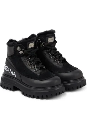 Dolce & Gabbana Stivaletti in pelle con shearling