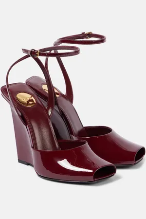 Saint Laurent Sandali La Scandale 110 in vernice con zeppa