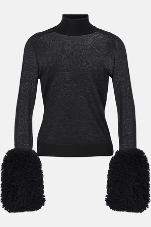 Alaïa Alaïa Lupetto in lana con pelliccia sintetica