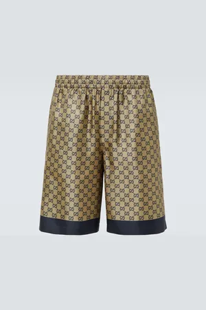 Gucci Shorts GG in twill di seta con stampa