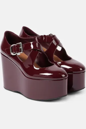 Alaïa Alaïa Pumps Criss Cross 110 in vernice con zeppa