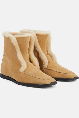 Totême Stivaletti in suede e shearling
