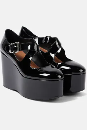 Alaïa Alaïa Pumps Criss Cross in vernice con zeppa