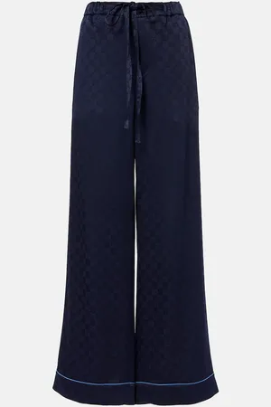 Gucci Pantaloni a gamba larga in raso GG