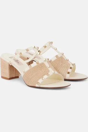 VALENTINO GARAVANI Mules Rockstud in pelle e rafia