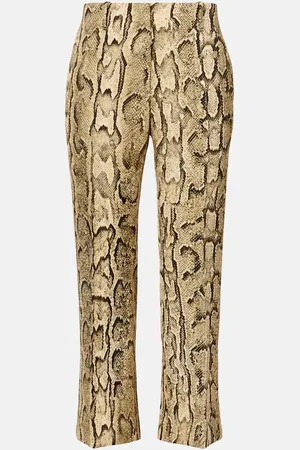 DRIES VAN NOTEN Pantaloni flared con stampa serpente