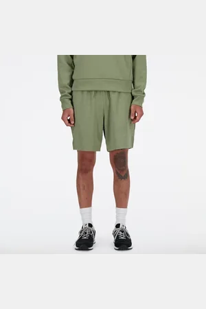 New Balance Uomo Tech Knit Short 7", Maglia di poliestere