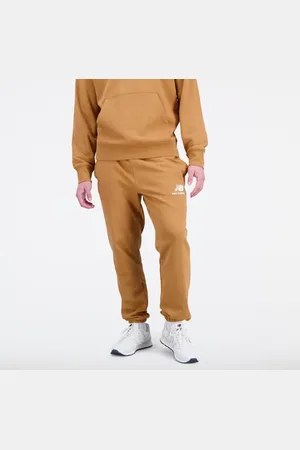 New Balance Uomo Pantaloni da tuta Essentials Stacked Logo French Terry Sweatpant