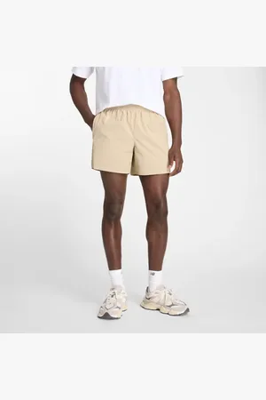 New Balance Uomo Athletics Stretch Woven Short 5", Politessuto