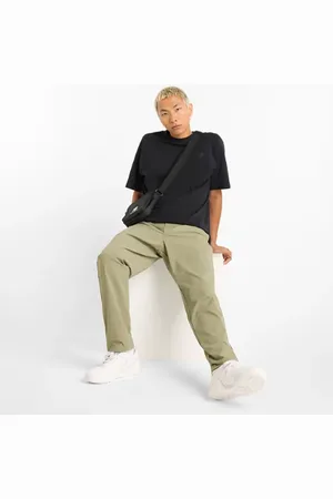 New Balance Uomo Athletics Ripstop Standard Tapered Pant 30", Politessuto