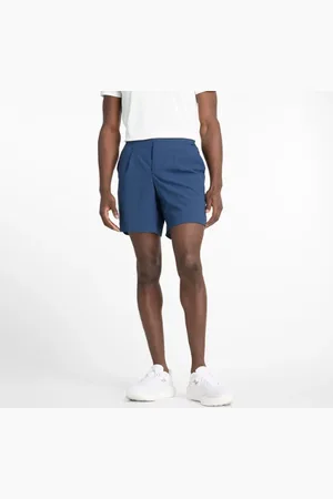 New Balance Uomo Tournament Short, Politessuto